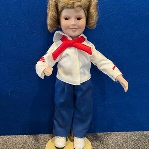 Shirley Temple Doll with Red Bow and Blue Pants